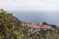 Taormina town on a hillside in Sicily overlooking Ionian sea Royalty Free Stock Photo