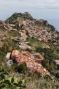 Taormina town on a mountain top in Sicily island on beautiful day Royalty Free Stock Photo