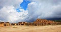 Taos Pueblo with dramatic clouds, New Mexico