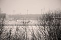 TAP Air Portugal plane on runway in Munich Airport, Germany, Winter time with snow Royalty Free Stock Photo