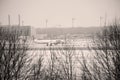 TAP Air Portugal plane on runway in Munich Airport, Germany, Winter time with snow Royalty Free Stock Photo