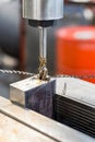A tap on a machine for tapping a hole in a part Royalty Free Stock Photo