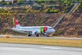 TAP Portugal Airbus A319-111 lands at Funchal Cristiano Ronaldo Airport Royalty Free Stock Photo