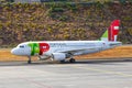 TAP Portugal Airbus A319-111 lands at Funchal Cristiano Ronaldo Airport Royalty Free Stock Photo