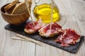 Serrano ham with toasted bread Royalty Free Stock Photo