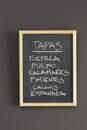 Tapas advertised on a blackboard Royalty Free Stock Photo