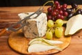 Tapas of blue cheese, thinly sliced pear and green and red grapes Royalty Free Stock Photo