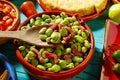 Tapas lima beans with iberico ham from Spain Royalty Free Stock Photo
