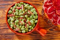 Tapas lima beans with iberico ham from Spain Royalty Free Stock Photo