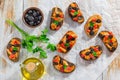 Tapas topped with fish fillet stewed in tomato sauce Royalty Free Stock Photo