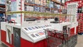 Tape closing off non-essential shopping items in a major supermarket during lockdown