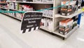 Tape closing off non-essential shopping items in a major supermarket. A national lockdown sees the sale of non-essential items