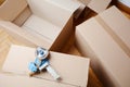 Tape dispenser sealing a shipping cardboard box Royalty Free Stock Photo