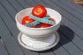 Tape measure around tomatoes on a scales Royalty Free Stock Photo