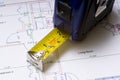 Tape Measure on Floor Plans Royalty Free Stock Photo