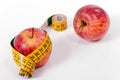 Tape measure and red apple Royalty Free Stock Photo