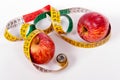 Tape measure and red apple Royalty Free Stock Photo