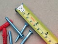 Tape measure and screws Royalty Free Stock Photo