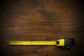 Tape Measure on a Wooden Work Table Royalty Free Stock Photo