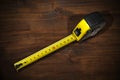 Tape Measure on a Wooden Work Table Royalty Free Stock Photo