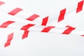 A tape with red and white stripes for the barrier prohibits passage Royalty Free Stock Photo