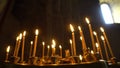 Taper Candles Burning in Church Royalty Free Stock Photo