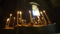 Taper Candles Burning in Church Royalty Free Stock Photo
