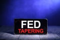 Taper Tantrum concept, global economic world market reacting to the Fed Tapering Off