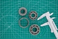 Tapered roller bearings or ball bearings and caliper