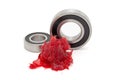 Tapered roller bearings with red lithium grease (Machinery Lubrication).