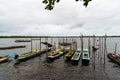 Fishing canoes docked on the Almas River in the city of Taperoa, Bahia