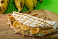 Tapioca with banana and cheese and honey. flatbread made from cassava also known as biju de tapioca. Beiju of tapioca, cassava- Royalty Free Stock Photo