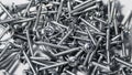 Tapping screws made od steel, metal screw, iron screw, chrome screw, as a background, wood