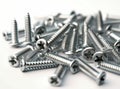 Tapping screws made of steel on Gray background, metal screw, iron screw, chrome screw, screws as a background, wood Royalty Free Stock Photo