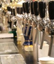 taps to spill beer in the London pub Royalty Free Stock Photo