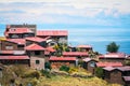 Taquile island houses and Titicaca lake