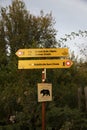 TARA Mountain, Serbia - September 16, 2020: Sign post depicting hiking trails and Bear encounter warning in national park Tara Royalty Free Stock Photo