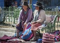 Unidentified indigenous native Quechua people in traditional clothing at the local Tarabuco Sunday Market, Bolivia