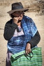 Unidentified indigenous native Quechua woman at the local Tarabuco Sunday Market, Bolivia Royalty Free Stock Photo