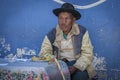 Unidentified indigenous Yampara man with traditional clothing and hat, on the local Tarabuco Sunday Market, Bolivia, South America