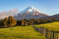 Taranaki volcano and picturesque farmland landscape, New Zealand Royalty Free Stock Photo