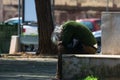Taranto, Apulia / Italy - 03/23/2019 : A lost homeless old man depressed on bench Royalty Free Stock Photo