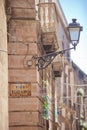 Taranto, Apulia - An old street lamp fixed at a house facade Royalty Free Stock Photo