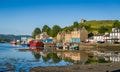 Tarbert pier with fisherman`s boats and ferry.