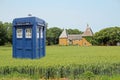 Tardis in crop field Royalty Free Stock Photo