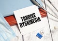 Tardive Dyskinesia - Diagnosis written on white sticker with stethoscope