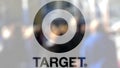 Target Corporation logo on a glass against blurred crowd on the steet. Editorial 3D rendering