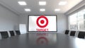 Target Corporation logo on the screen in a meeting room. Editorial 3D rendering