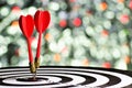 Target and darts. Regular accurate hitting of the target. Royalty Free Stock Photo