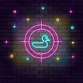 Target duck shooting neon on wall. Dark background brick wall neon icon